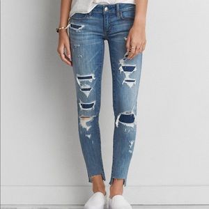 Low- waisted medium wash distress jeans